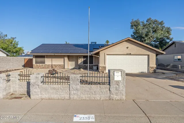 a front view of a house with a porch