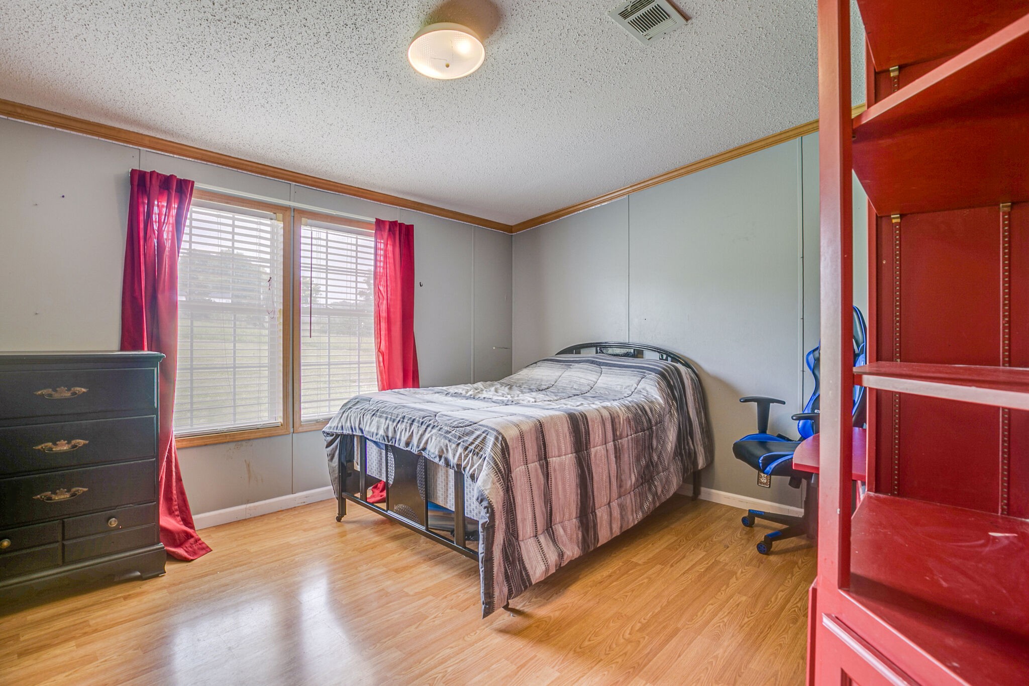 612 Norene Road Lebanon, TN 37090 - Photo 13 of 31 a bed sitting in a room next to a window