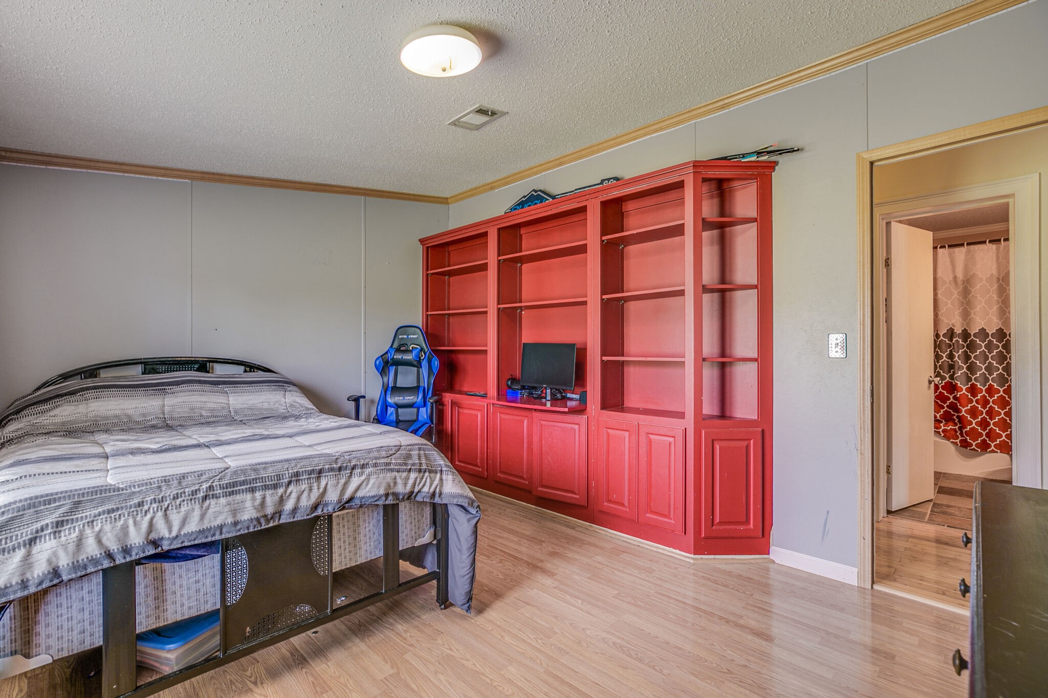 612 Norene Road Lebanon, TN 37090 - Photo 14 of 31 a bedroom with a bed and wooden floor