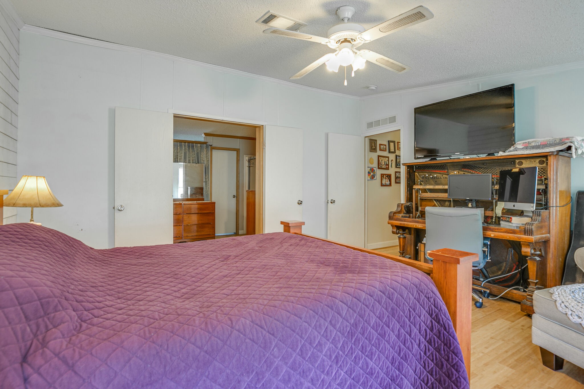 612 Norene Road Lebanon, TN 37090 - Photo 18 of 31 a bedroom with a bed and a flat screen tv