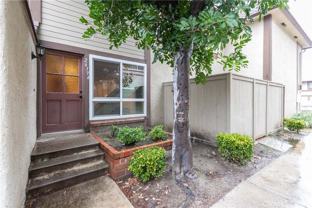 Terrific 2 bedroom, 2 bath townhome with a fenced patio and attached garage.