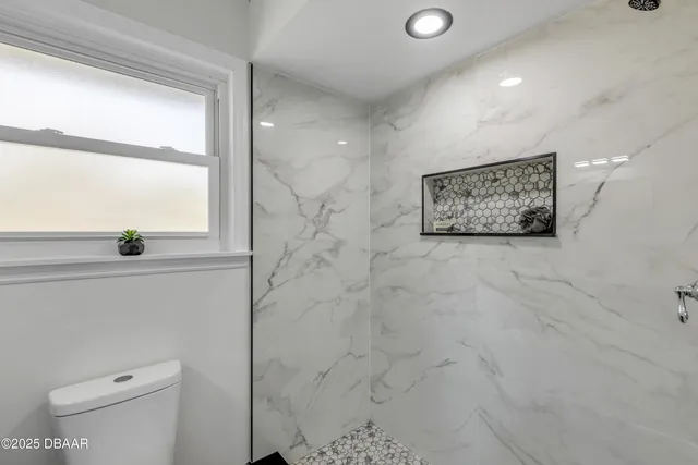 a living room with furniture and window