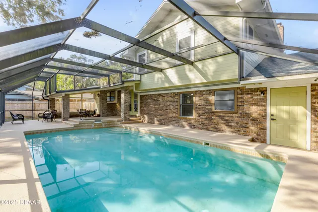 a view of outdoor space yard and swimming pool