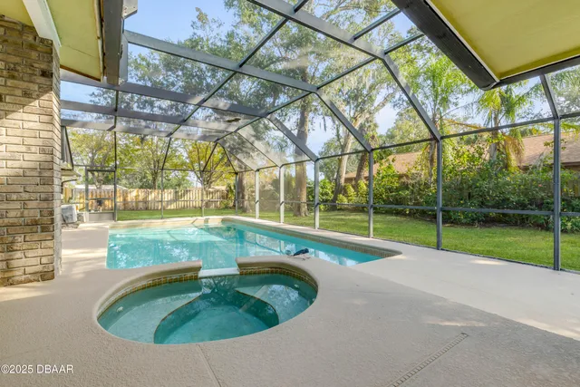 a outdoor dining space with furniture and garden view