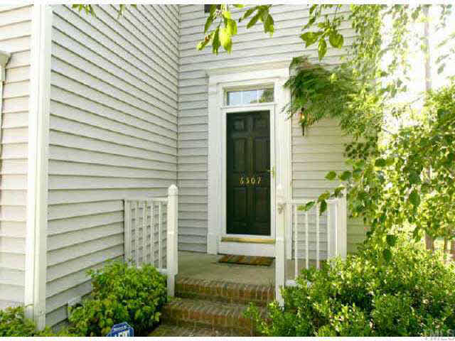6507 Draebury Lane Durham, NC 27713 - Photo 1 of 9 a view of a entryway door front of house