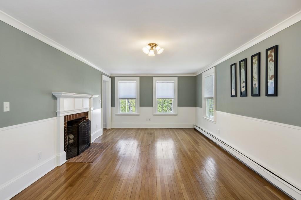 16 Bashaw Road Sutton, MA 01590 - Photo 12 of 37 wooden floor in an empty room with a window
