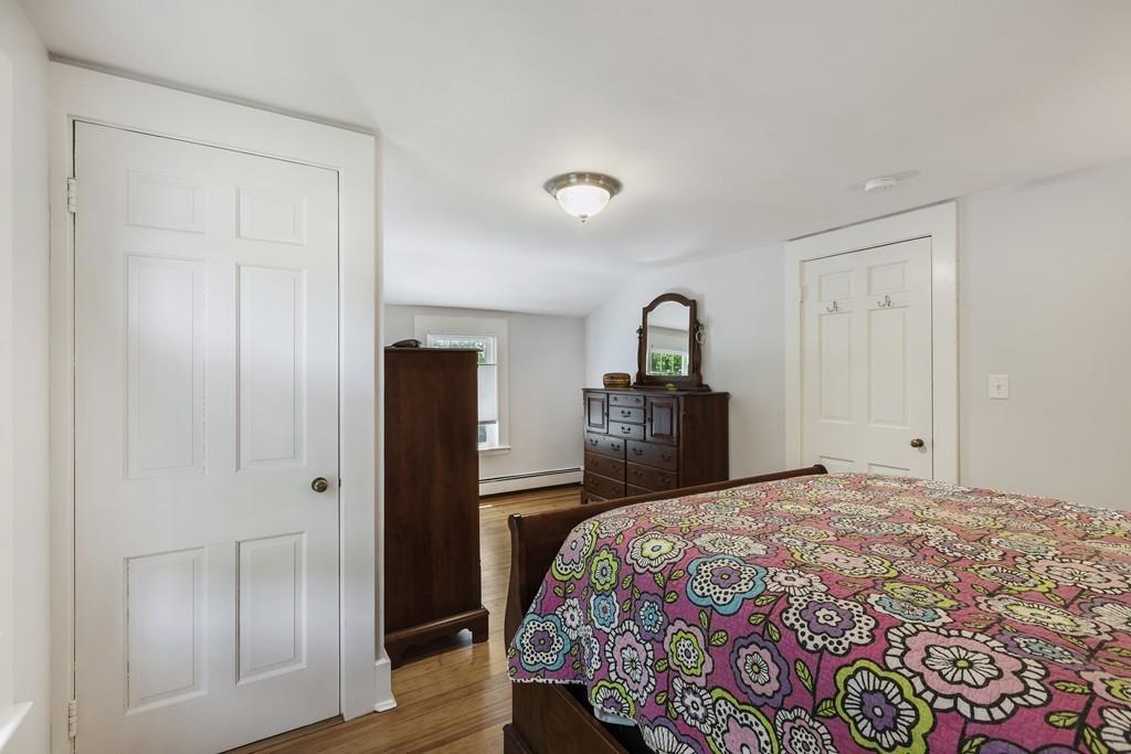 16 Bashaw Road Sutton, MA 01590 - Photo 21 of 37 a bedroom with a large bed and a closet