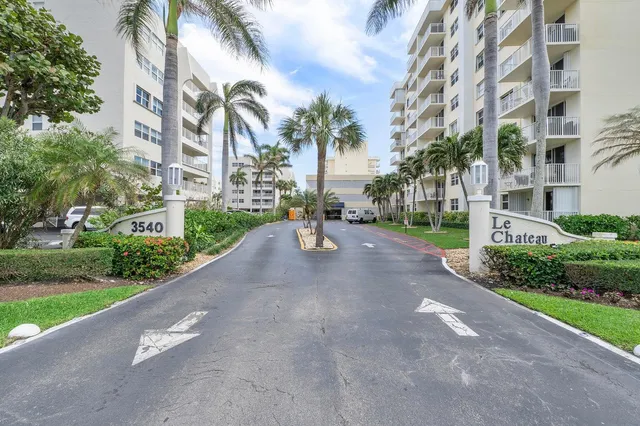 a living room with furniture a table and chairs