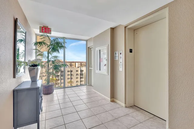 an aerial view of a house with a lake view