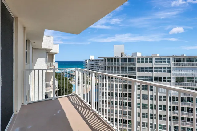a view of a balcony with city view