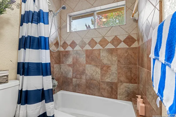 a bathroom with a sink and a bathtub