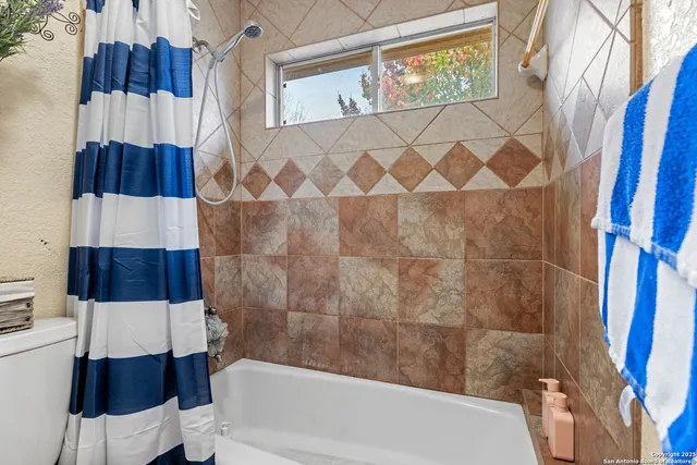 a bathroom with a sink and a bathtub