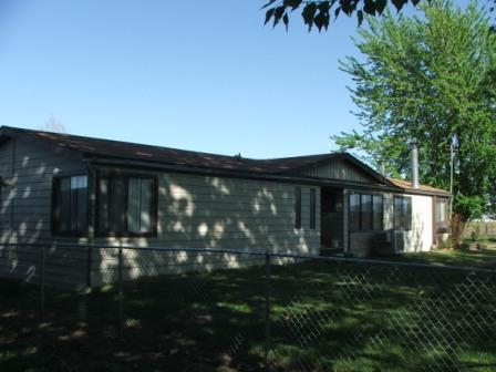15531 Fisk Road Yakima, WA 98908 - Photo 1 of 2 a front view of house with yard and green space