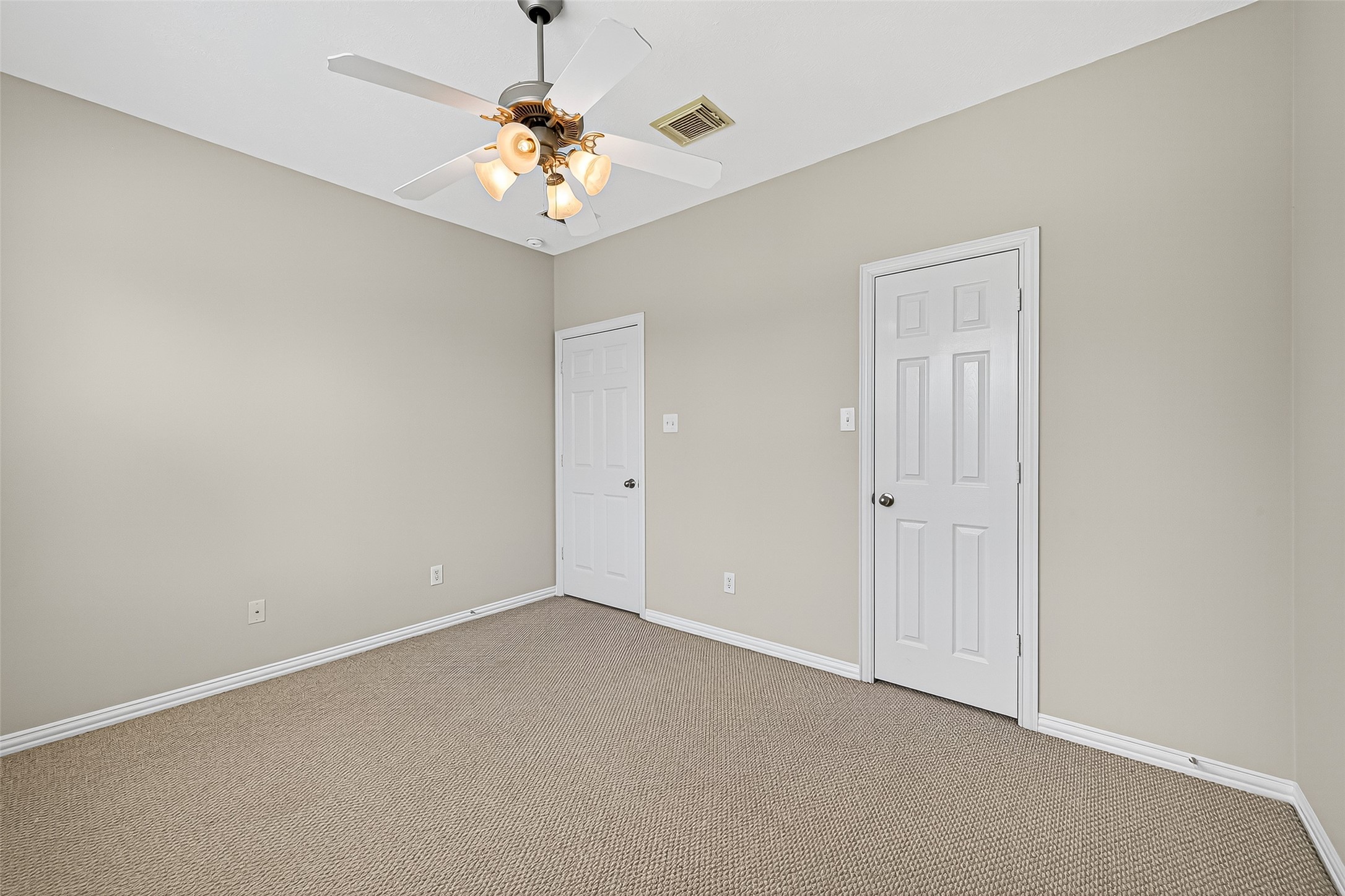30 Whetstone Ridge Way The Woodlands, TX 77382 - Photo 29 of 39 a view of a chandelier fan and fire place