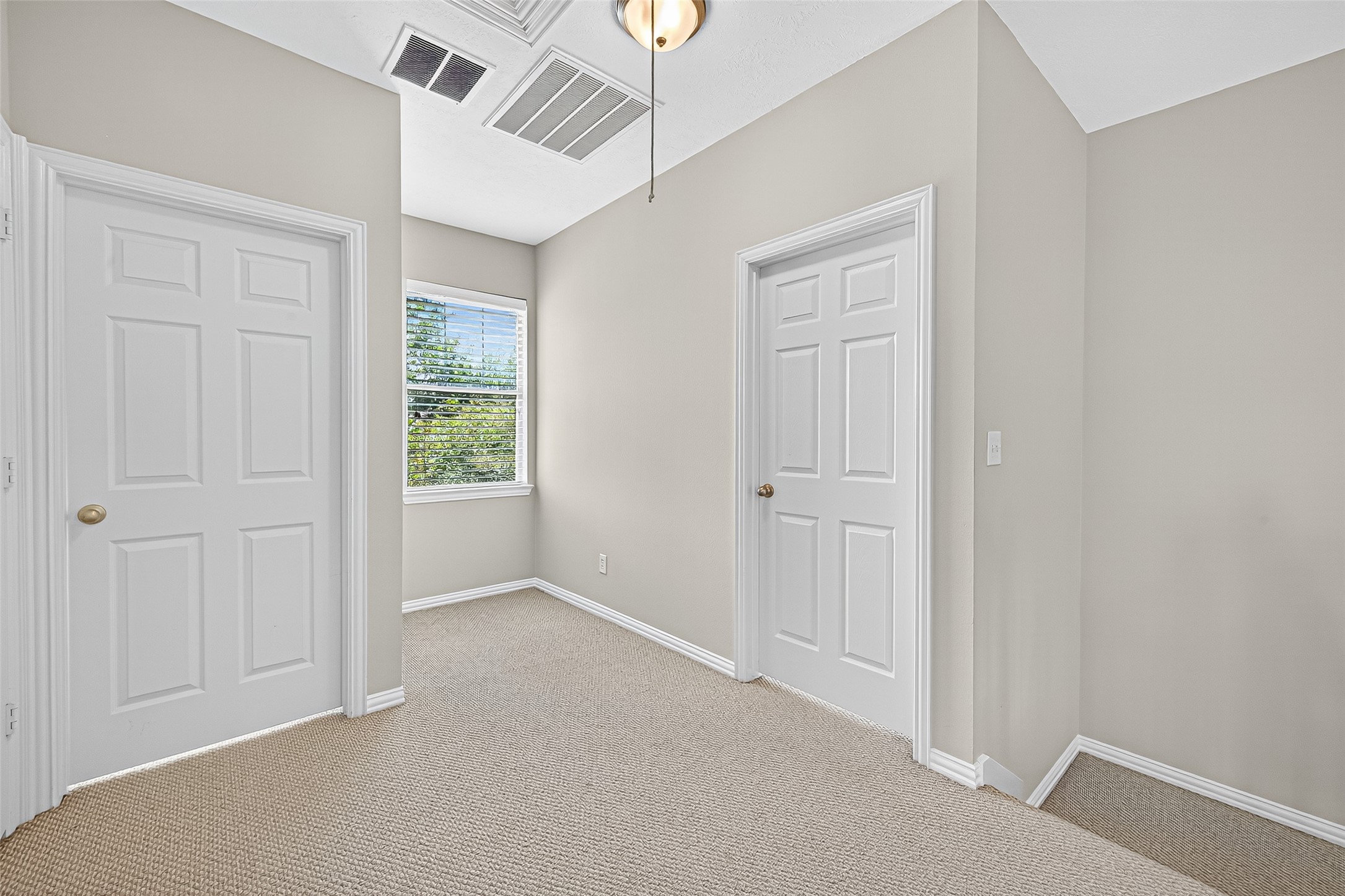 30 Whetstone Ridge Way The Woodlands, TX 77382 - Photo 31 of 39 a view of an empty room with a window