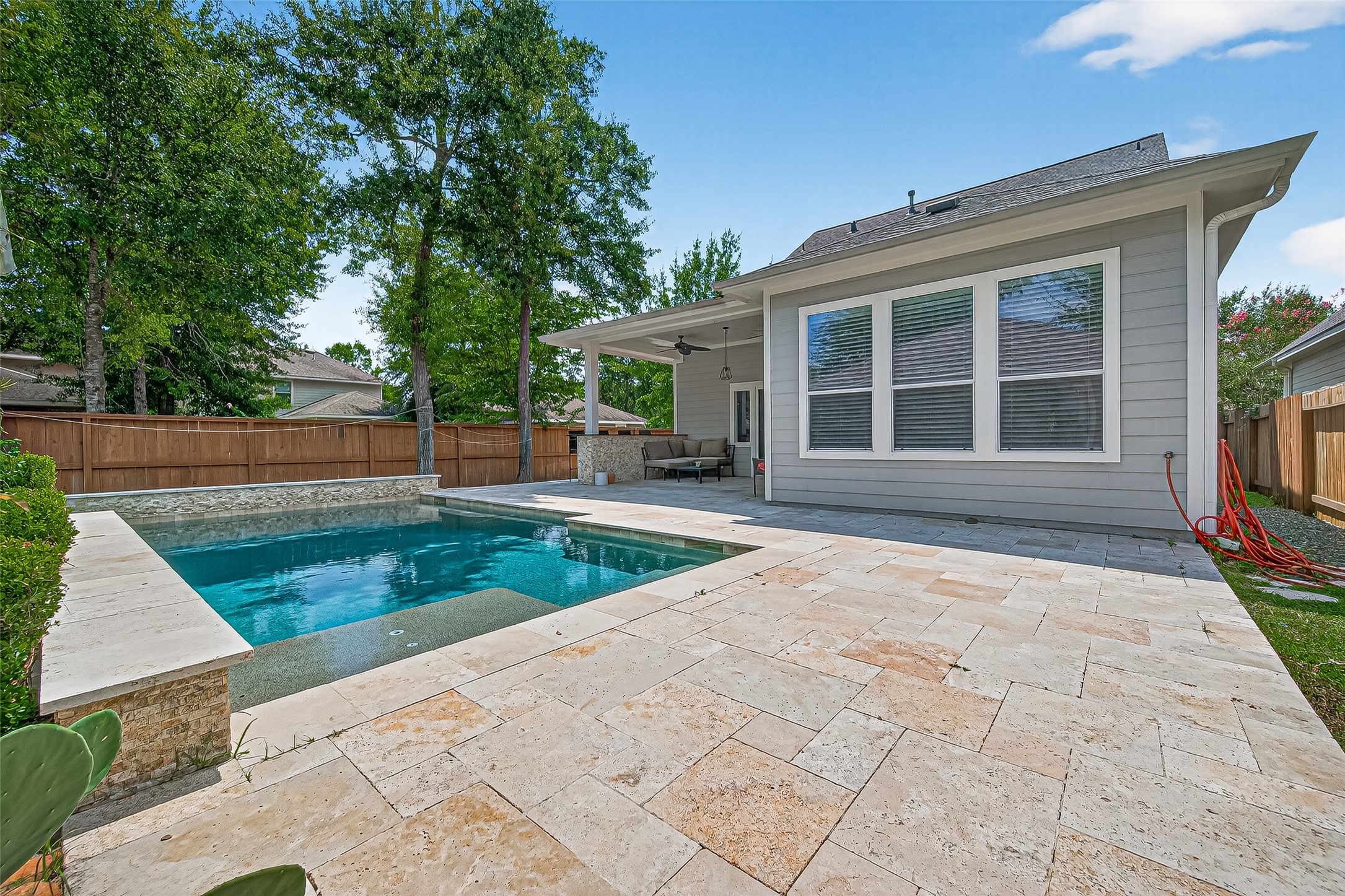 30 Whetstone Ridge Way The Woodlands, TX 77382 - Photo 38 of 39 a view of a house with a yard