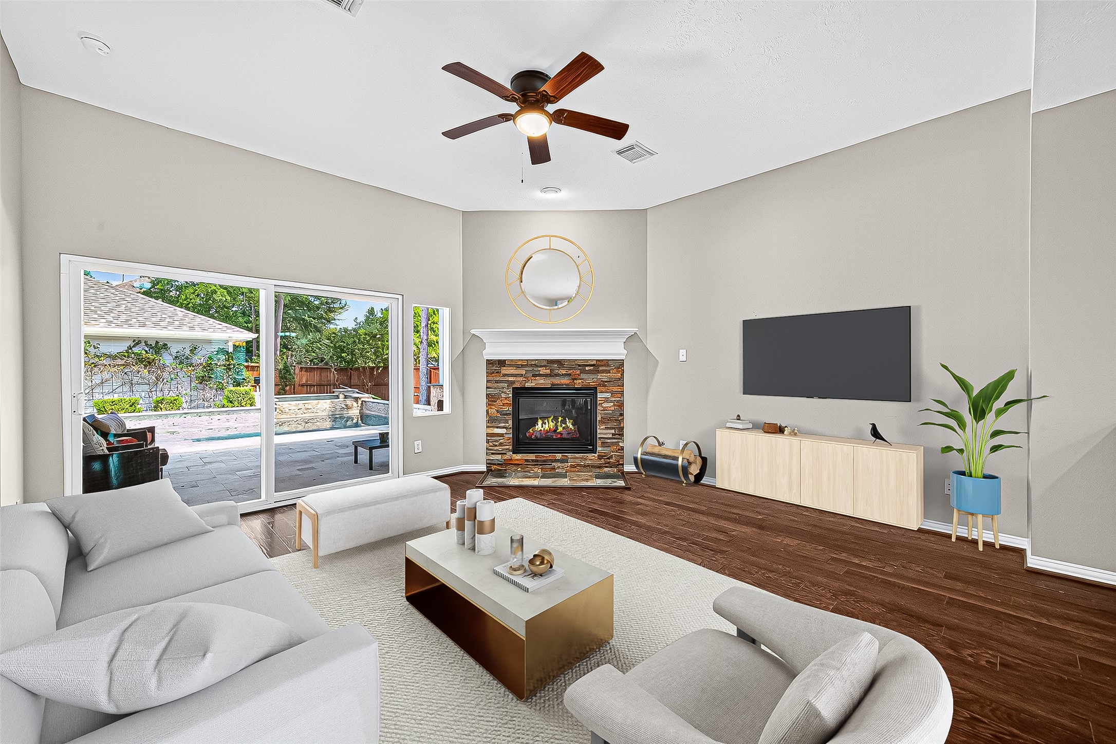 30 Whetstone Ridge Way The Woodlands, TX 77382 - Photo 6 of 39 a living room with furniture fireplace and a large window