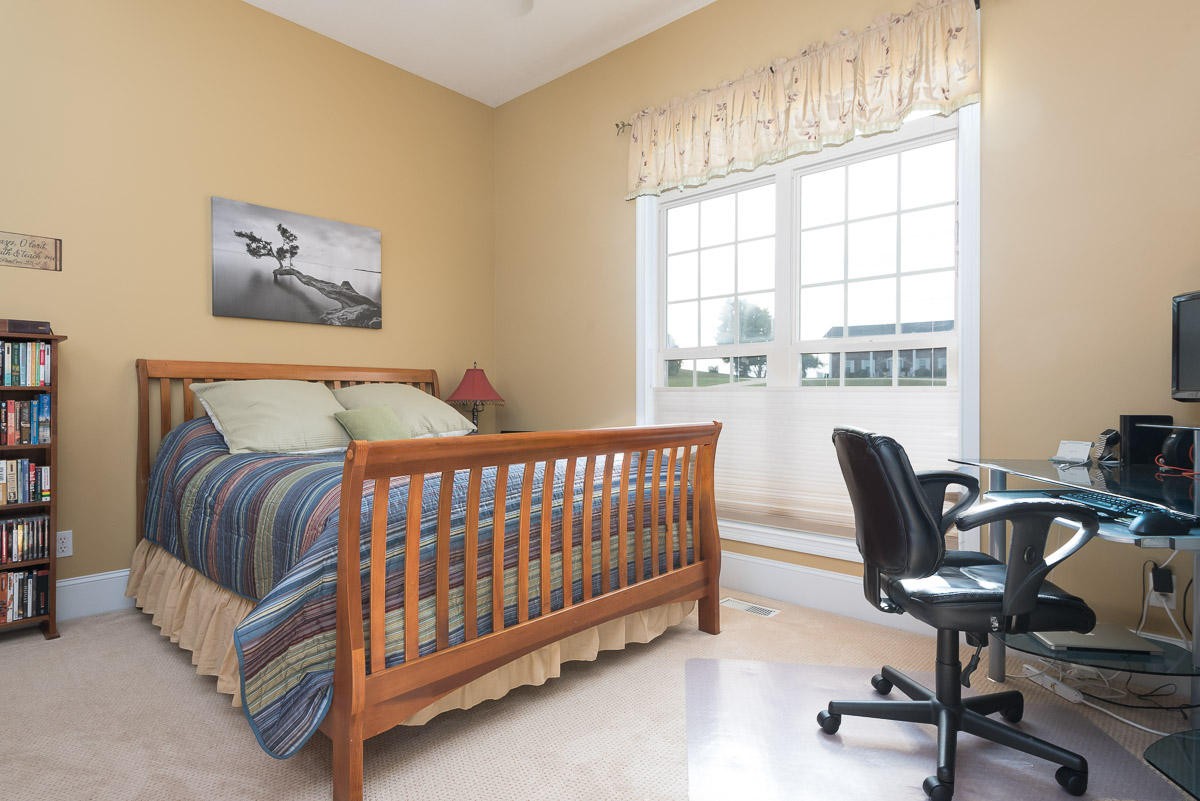 3929 Old Niles Ferry Road Maryville, TN 37801 - Photo 13 of 26 a bedroom with a bed and a large window