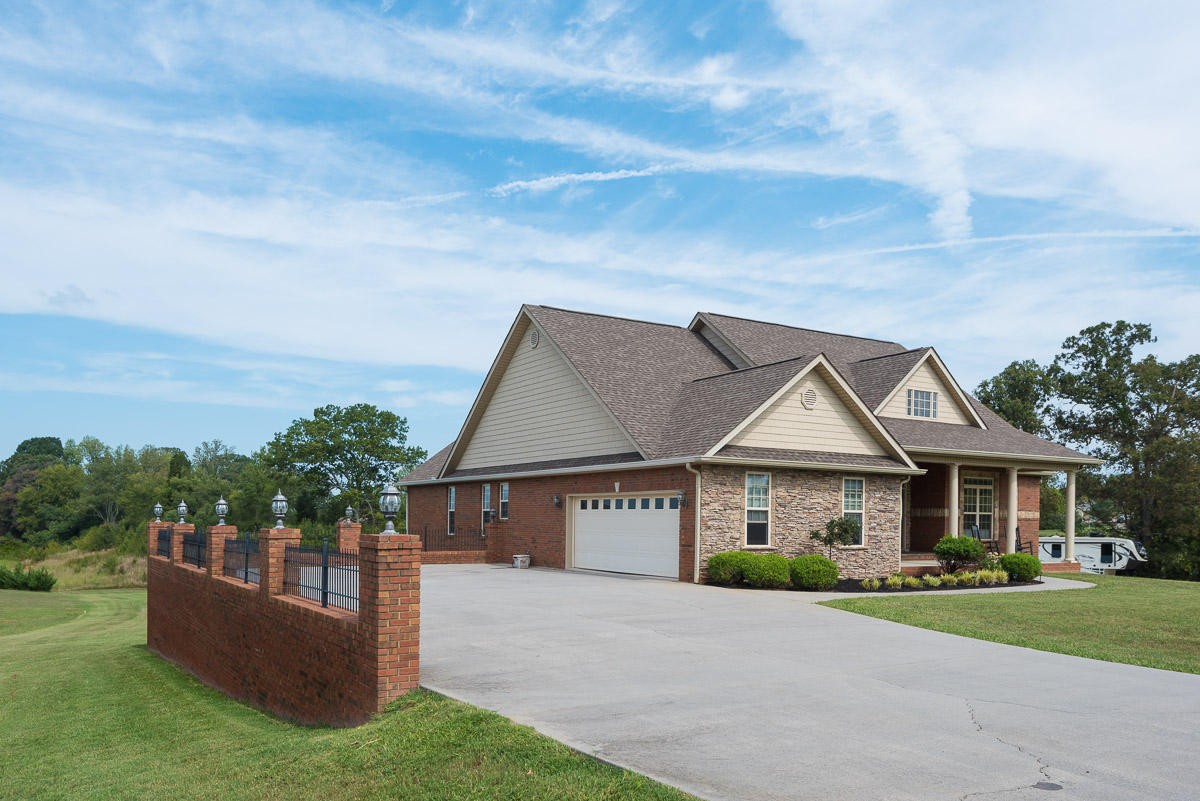 3929 Old Niles Ferry Road Maryville, TN 37801 - Photo 2 of 26 a front view of a house with a yard