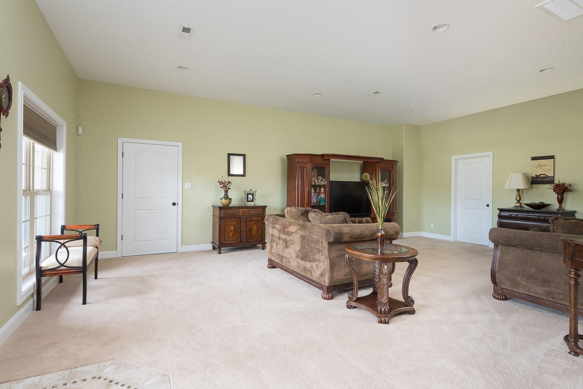 3929 Old Niles Ferry Road Maryville, TN 37801 - Photo 21 of 26 a living room with furniture and a flat screen tv
