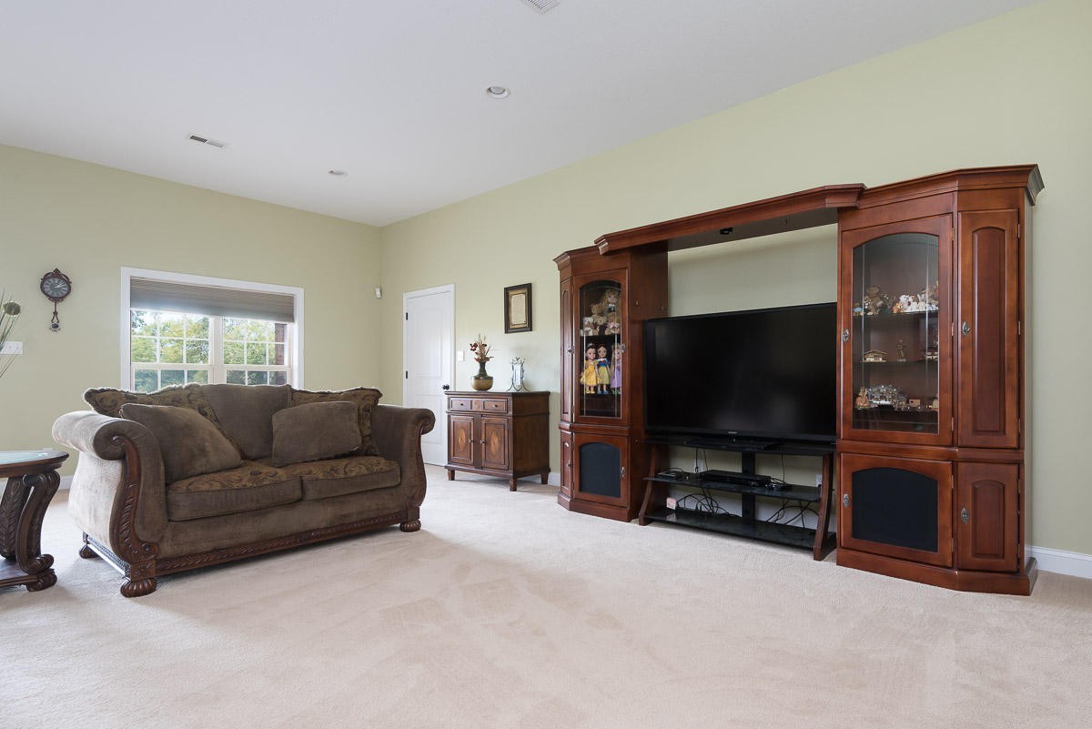 3929 Old Niles Ferry Road Maryville, TN 37801 - Photo 22 of 26 a living room with furniture and a flat screen tv