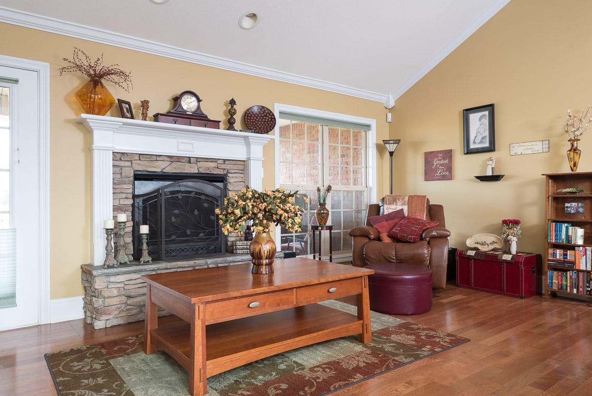 3929 Old Niles Ferry Road Maryville, TN 37801 - Photo 6 of 26 a living room with furniture a fireplace and a window