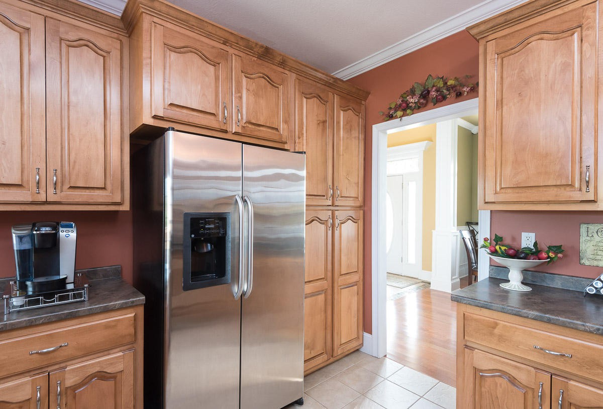 3929 Old Niles Ferry Road Maryville, TN 37801 - Photo 7 of 26 a kitchen with granite countertop stainless steel appliances a refrigerator and cabinets