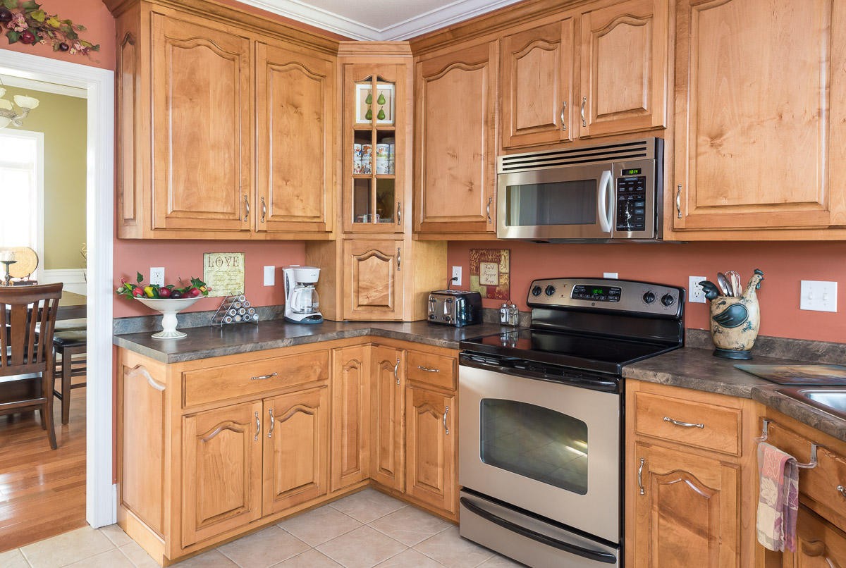 3929 Old Niles Ferry Road Maryville, TN 37801 - Photo 8 of 26 a kitchen with granite countertop a stove a sink and dishwasher