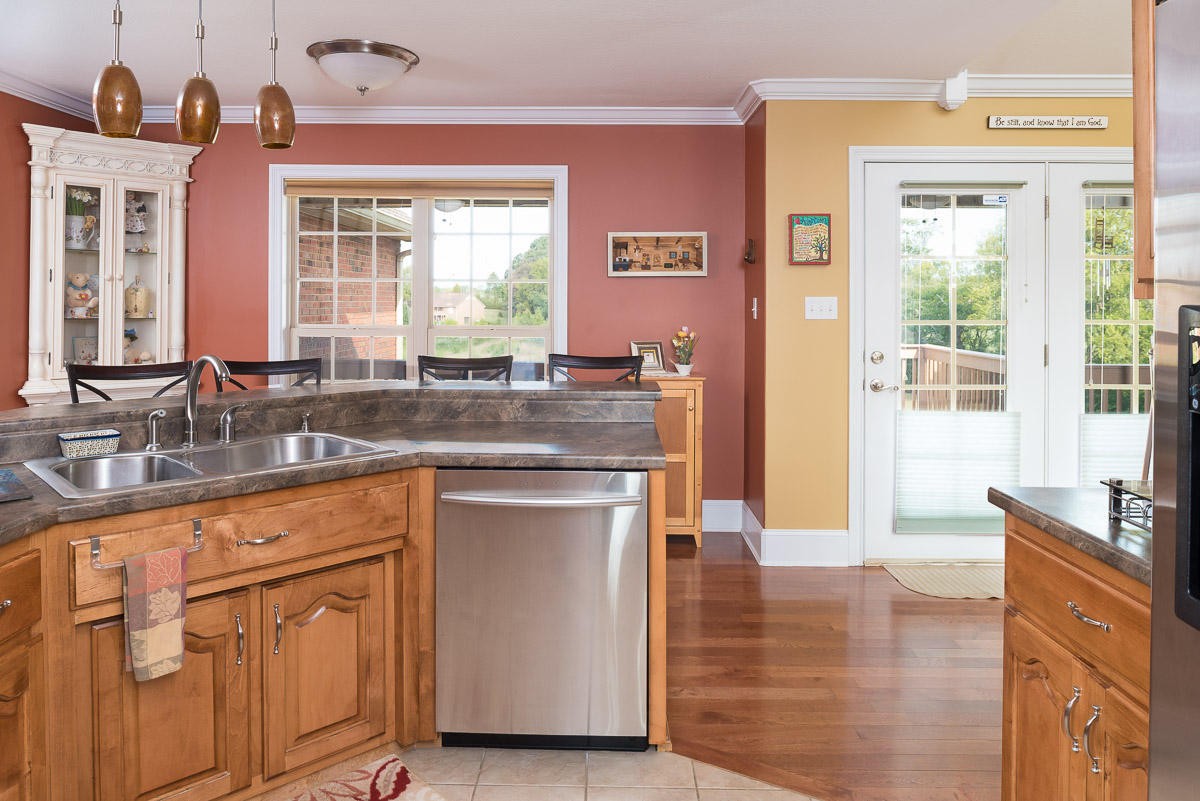 3929 Old Niles Ferry Road Maryville, TN 37801 - Photo 9 of 26 a kitchen with granite countertop a stove and a sink