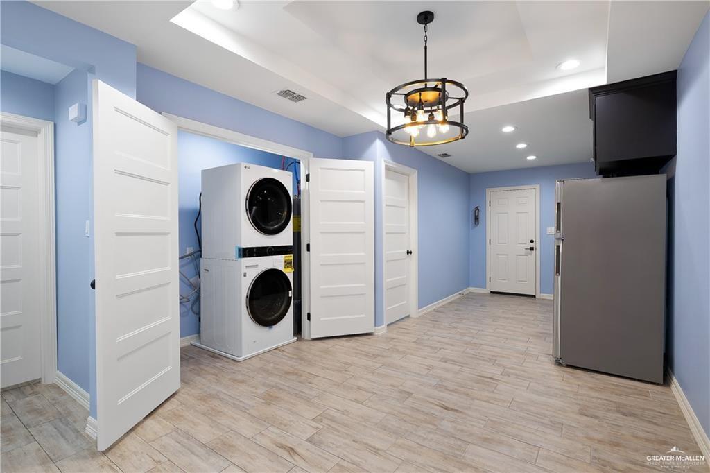 2118 Earth Lane Mission, TX 78573 - Photo 14 of 26 a view of a livingroom with a kitchen