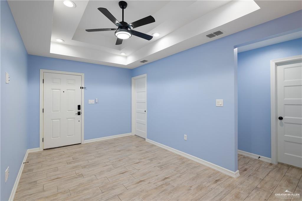 2118 Earth Lane Mission, TX 78573 - Photo 20 of 26 wooden floor in an empty room
