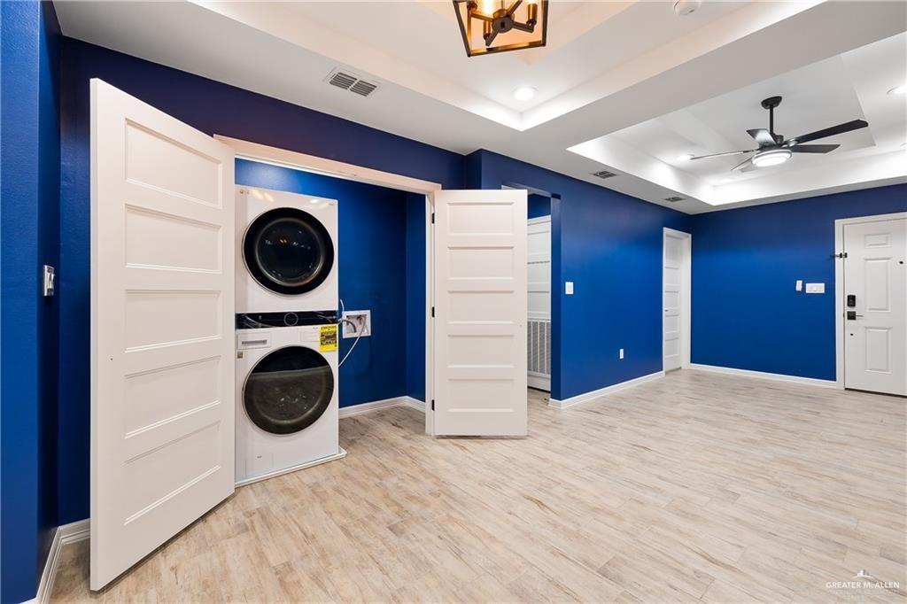 2118 Earth Lane Mission, TX 78573 - Photo 5 of 26 a view of a kitchen with a washer and dryer