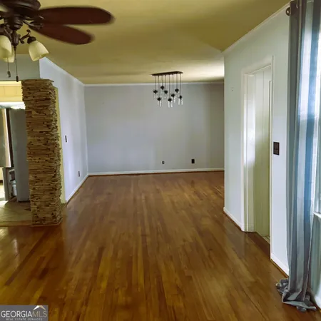 an empty room with a fireplace