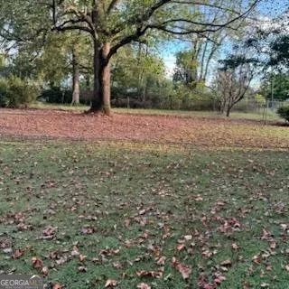a view of room with hardwood floor