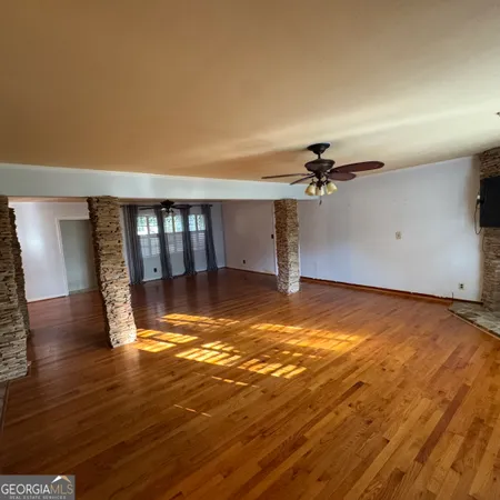 a view of a yard from a balcony