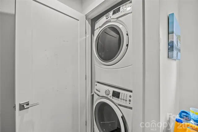a bathroom with double vanity sink and a mirror