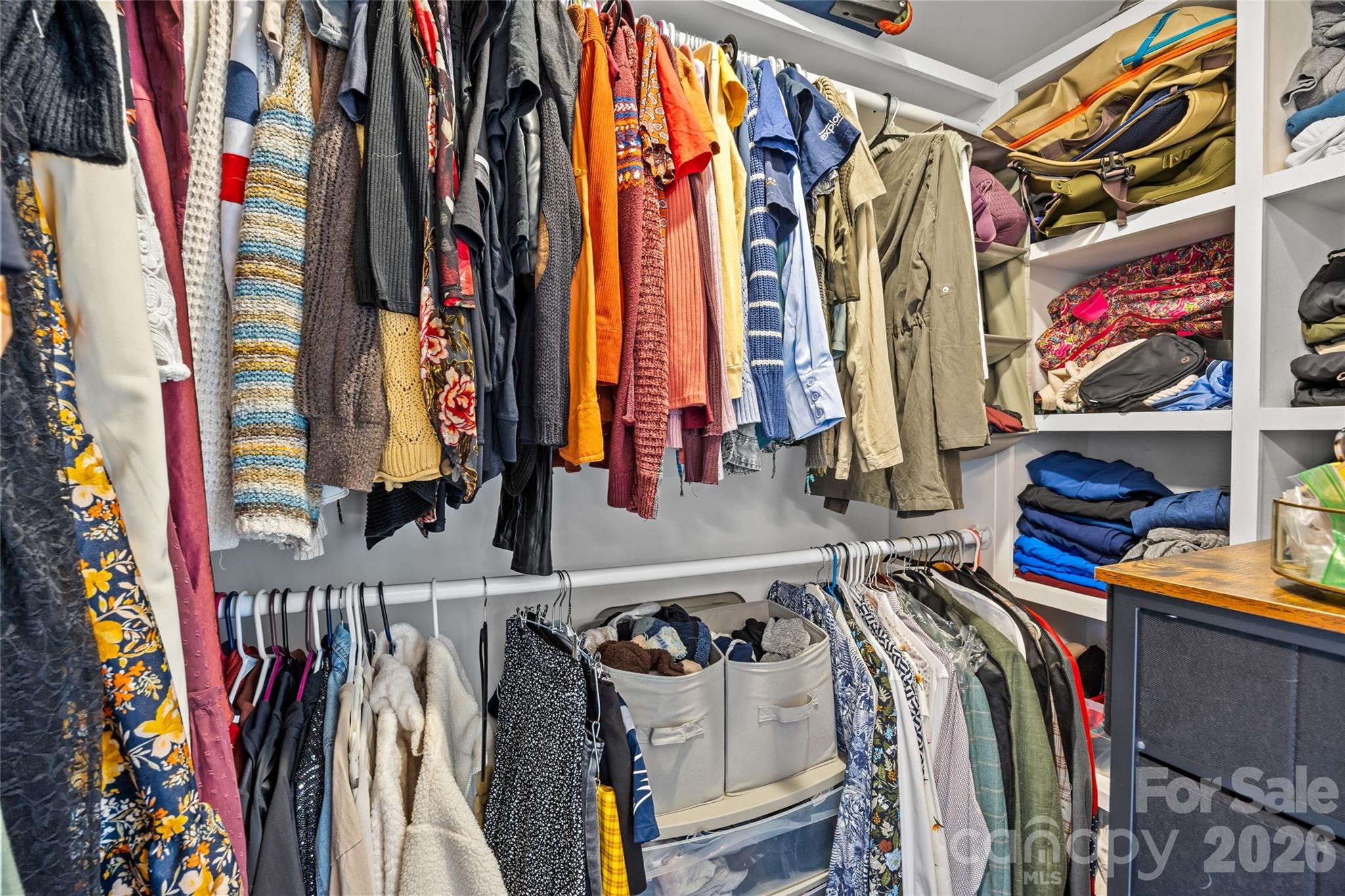 1108 North Alexander Street Charlotte, NC 28206 - Photo 27 of 37 a view of walk in closet with clothes