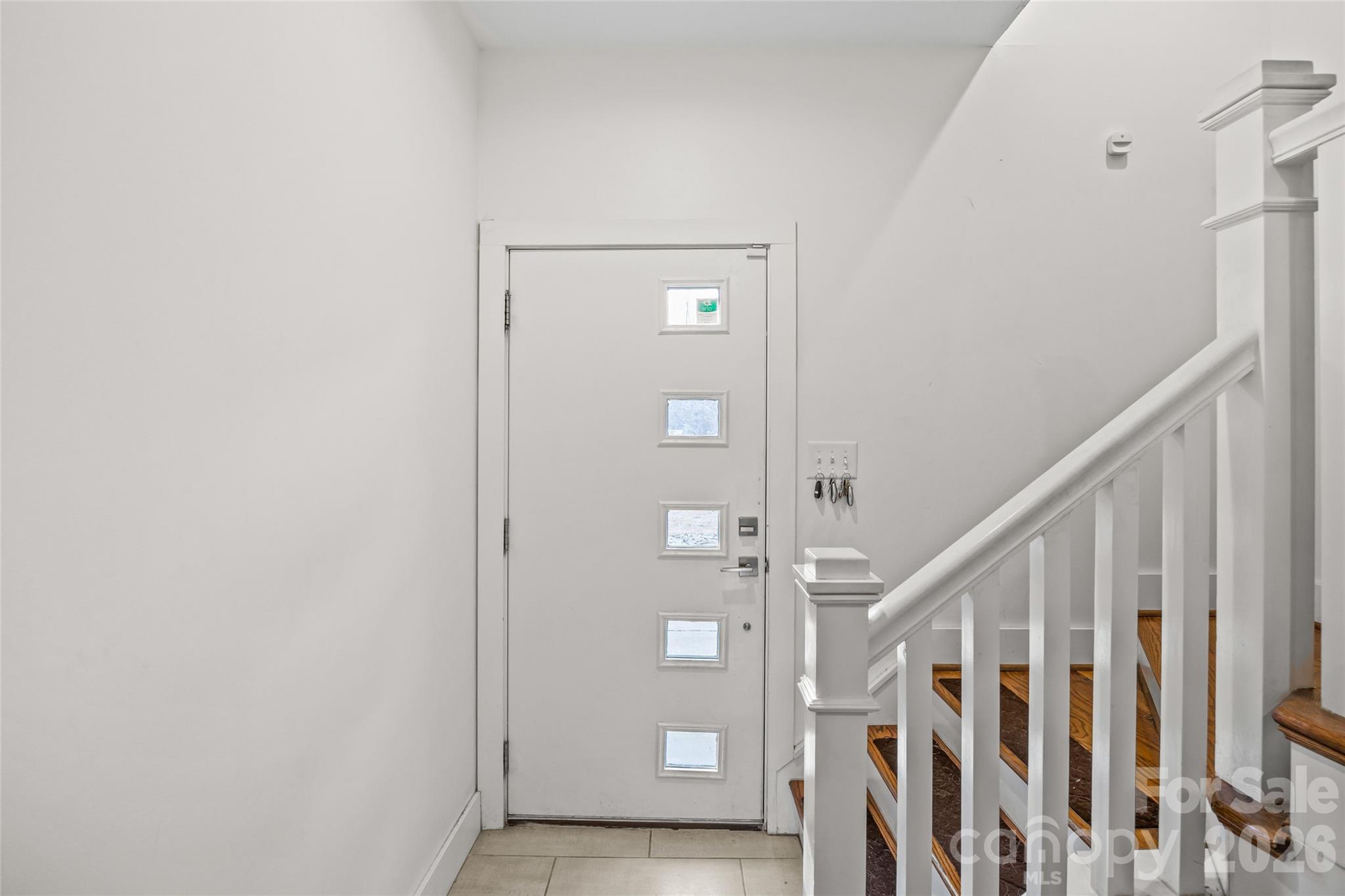 1108 North Alexander Street Charlotte, NC 28206 - Photo 4 of 37 a view of entryway with stairs