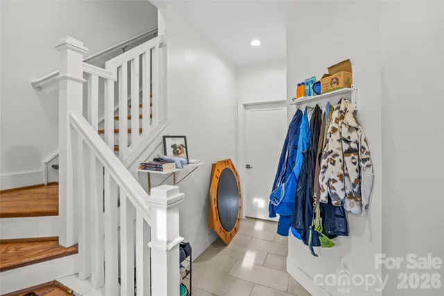 a kitchen with granite countertop a stove and a sink