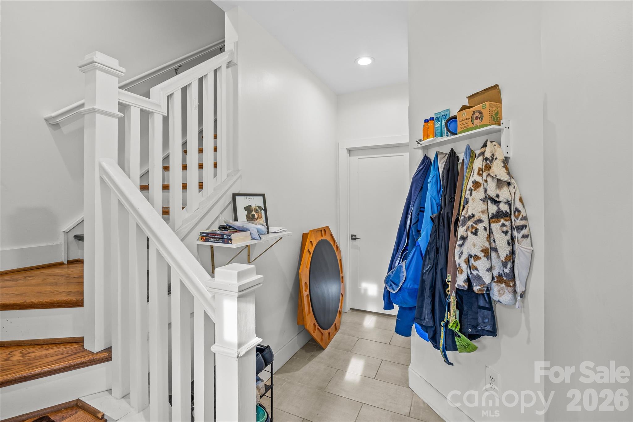 1108 North Alexander Street Charlotte, NC 28206 - Photo 5 of 37 a view of an entryway with wooden floor
