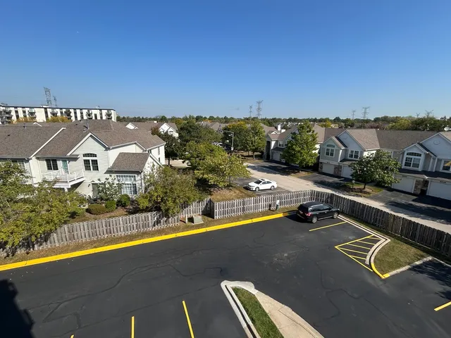 a view of swimming pool from a balcony