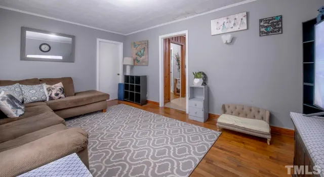 a living room with furniture and a couch