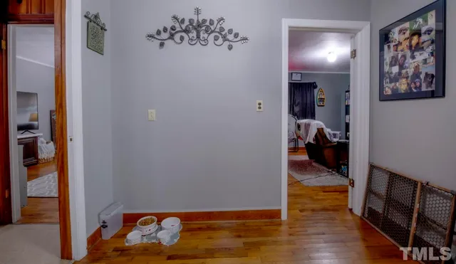 a bed room with a bed and a view of bathroom