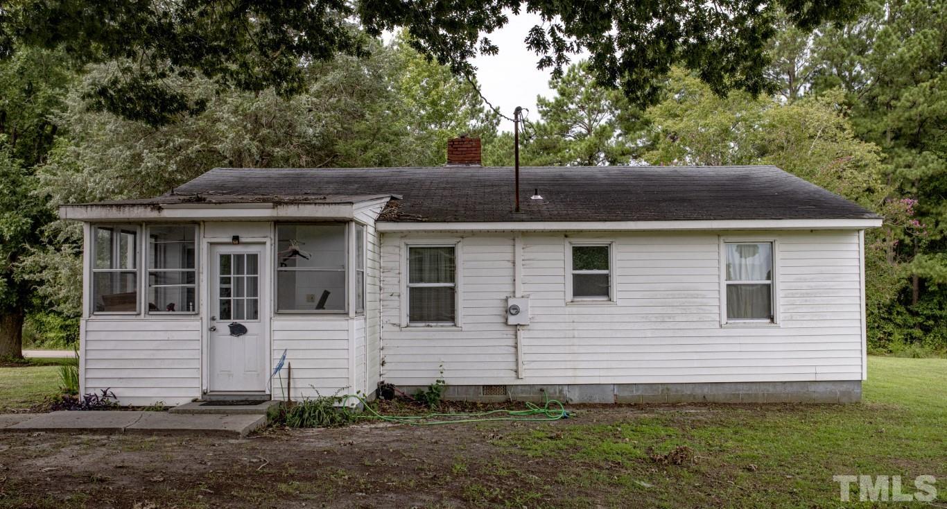 3795 Seven Paths Road Louisburg, NC 27549 - Photo 2 of 21 a view of a house with a yard