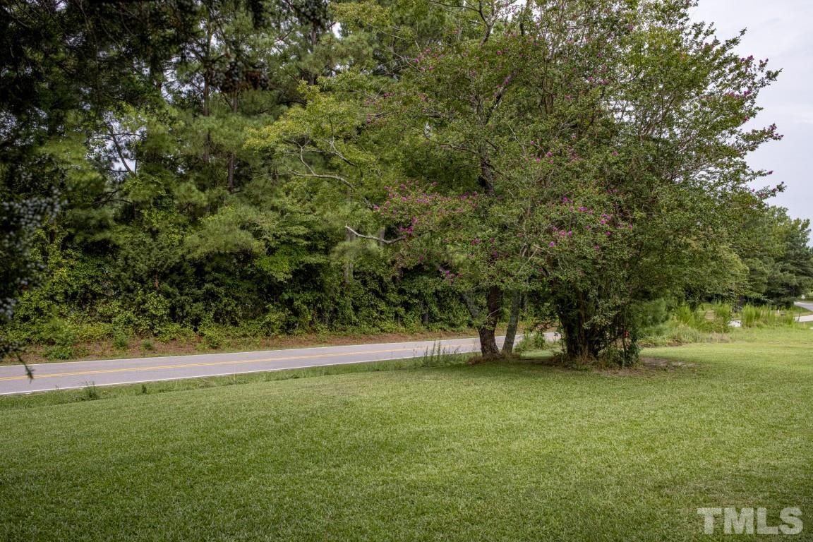 3795 Seven Paths Road Louisburg, NC 27549 - Photo 3 of 21 a view of outdoor space with deck and yard