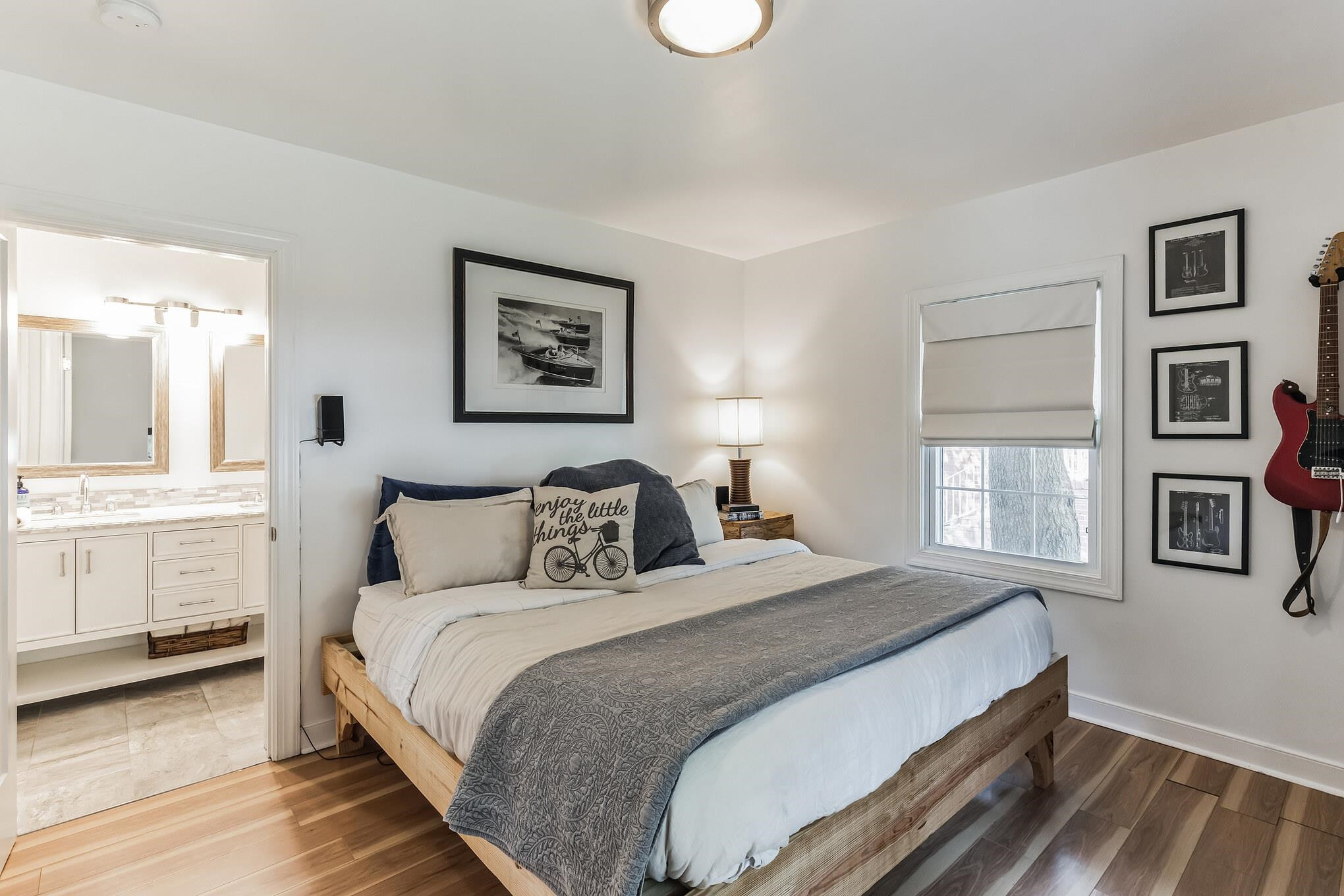 1203 North Miami Boulevard Durham, NC 27703 - Photo 13 of 22 a bed room with a bed and a window