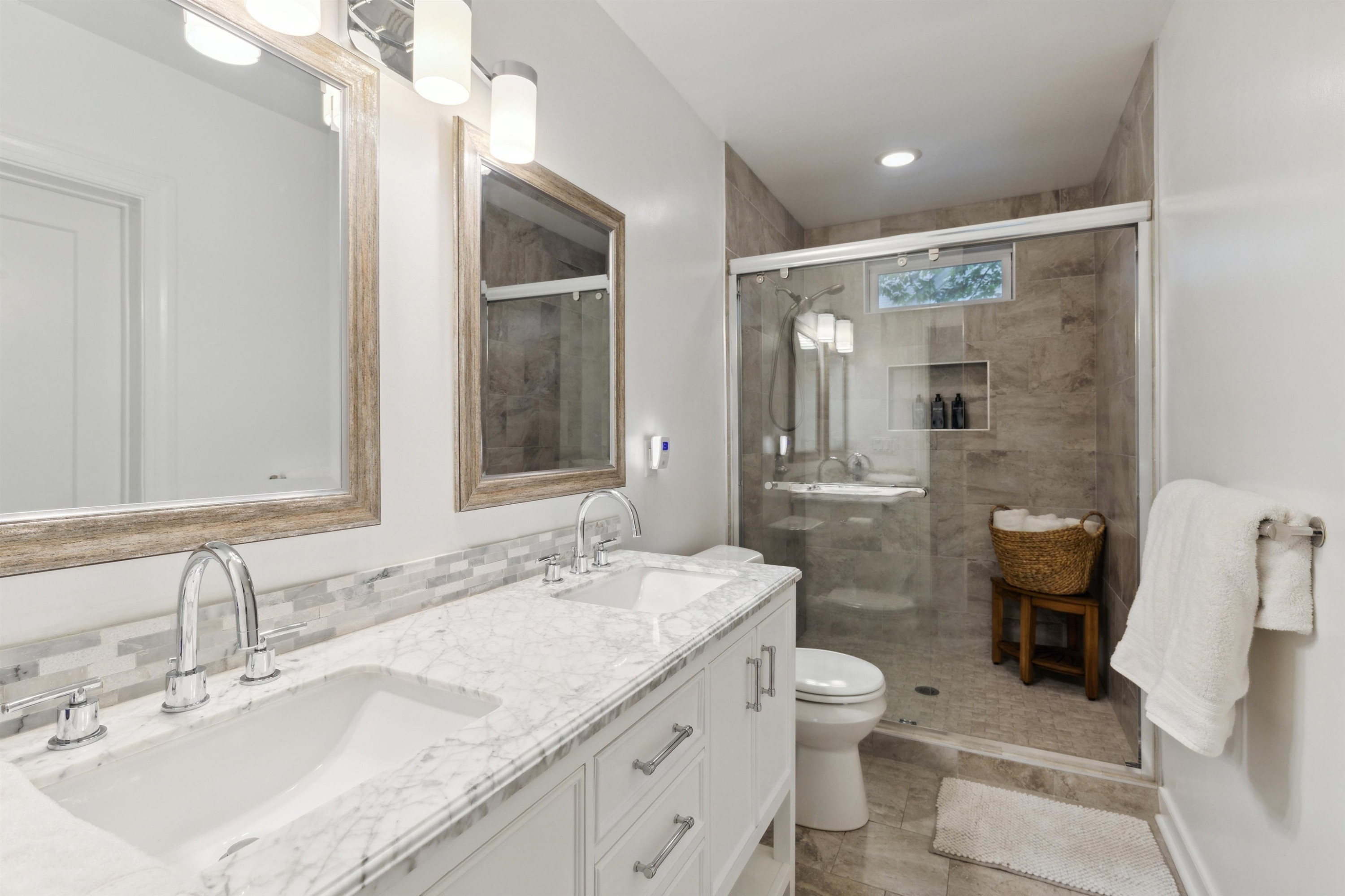 1203 North Miami Boulevard Durham, NC 27703 - Photo 15 of 22 a bathroom with a granite countertop sink a toilet and a mirror