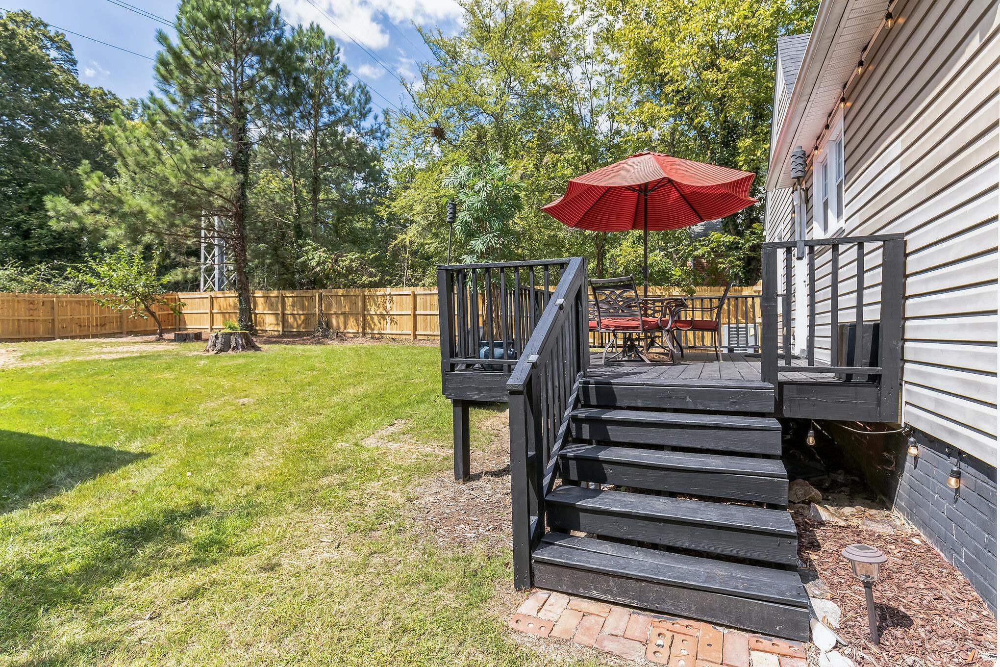 1203 North Miami Boulevard Durham, NC 27703 - Photo 22 of 22 a view of a yard with a slide