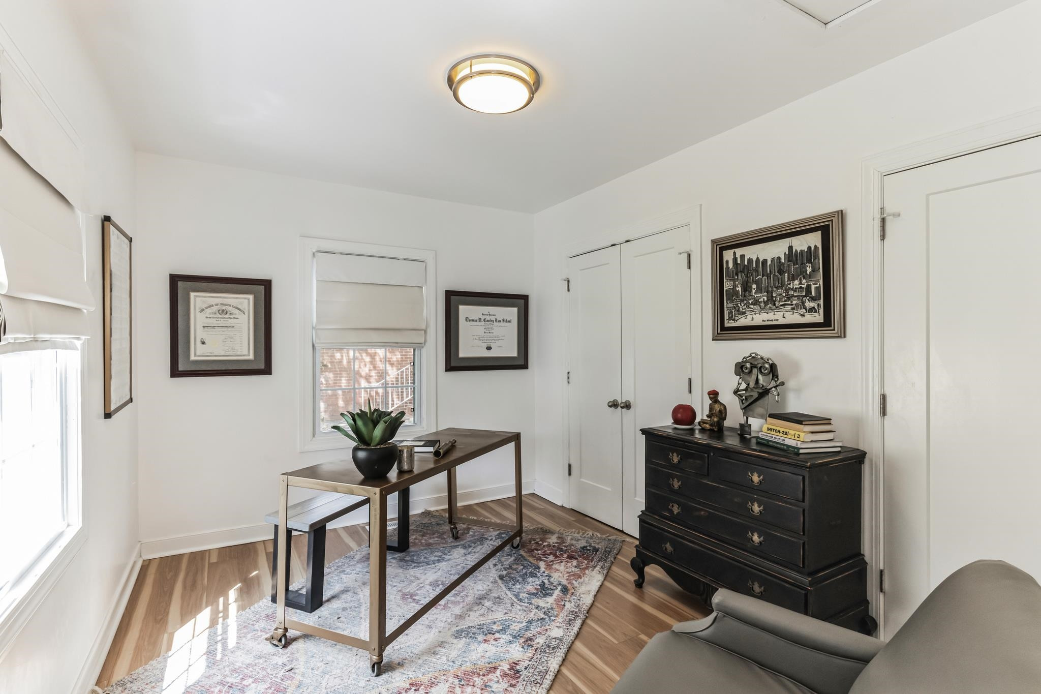 1203 North Miami Boulevard Durham, NC 27703 - Photo 9 of 22 a room with a table and a mirror