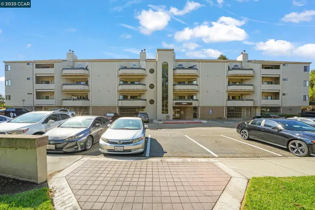a view of a patio with swimming pool